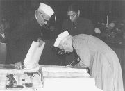 Jawaharlal Nehru Signing the Constitution